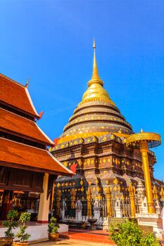 Golden pagoda in ancient buddhist temple at Lampang Province, Thailand
