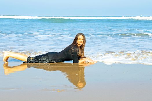 Beautiful woman in the water from the ocean