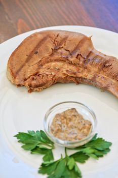 Boiled beef tongue with sauce