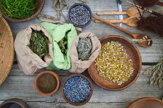 Alternative medicine - table full of herbs