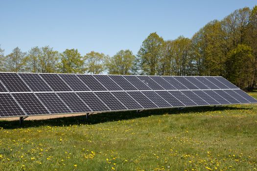 A set of solar panels on a meadow