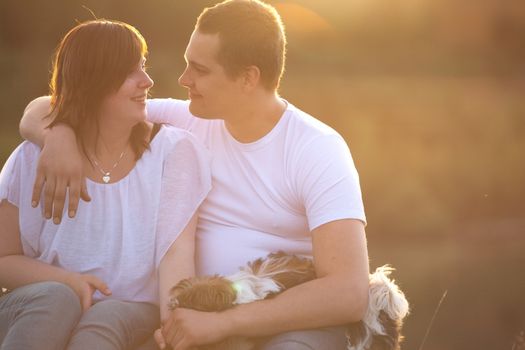 Young couple is having a romantic time in nature