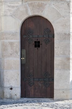Detailed view of a medieval wooden door.
