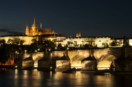 St. Vitus Cathedral and Charles bridge at night, Prague, Czech Republic.