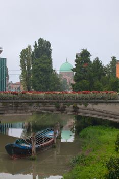 View of the boat under the bridge, Padova