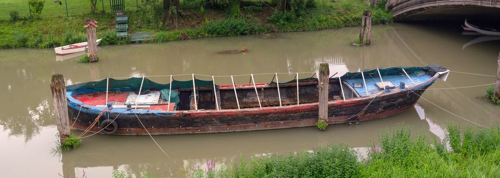 View of the boat in the Bacchiglione river, Padova