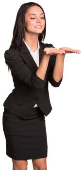 Beautiful businesswomen in suit looking at empty palms. Isolated on white background