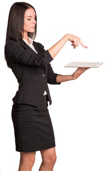 Beautiful businesswoman in suit using tablet. Isolated on white background