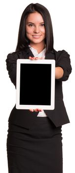 Beautiful businesswoman in suit holds tablet. Isolated on white background