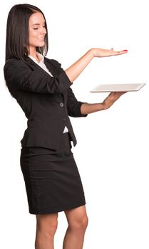 Beautiful businesswoman in suit using tablet. Isolated on white background