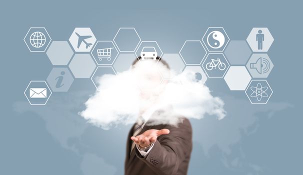 Businessman in suit hold cloud. World map and hexagons with icons as backdrop