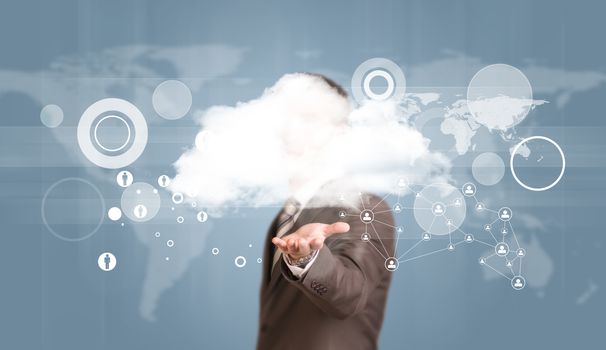 Businessman in suit hold cloud. World map and network as backdrop