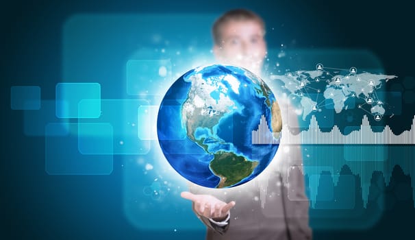 Businessman in suit hold Earth with graphs and network. Elements of this image are furnished by NASA