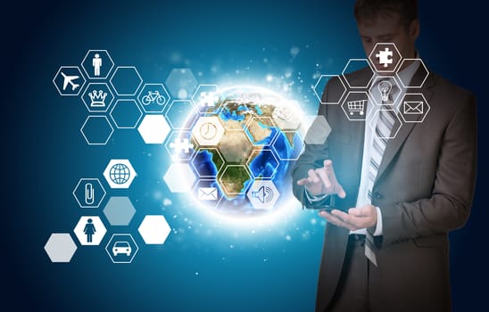 Businessman in suit hold empty copy space. Earth and hexagons with icons. Elements of this image are furnished by NASA