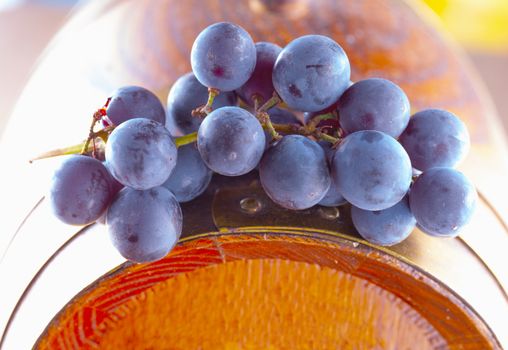 Black grape over barrell, close up