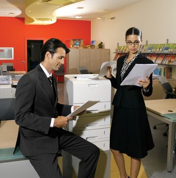 young workers using copy machine