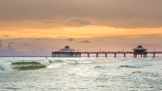 The beautiful sun setting on the shores of Fort Myers Beach located on Estero Island in Florida, United States of America