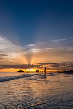 The beautiful sun setting on the shores of Fort Myers Beach located on Estero Island in Florida, United States of America