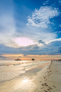 The beautiful sun setting on the shores of Fort Myers Beach located on Estero Island in Florida, United States of America