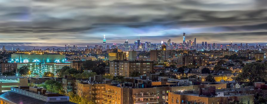 The view of Manhattan skyline at night from Queens, New York