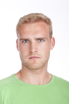 portrait of a young man with blond hair and blue eyes - isolated on white