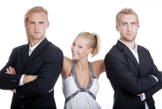 young woman in dress standing between two men in suits - isolated on white