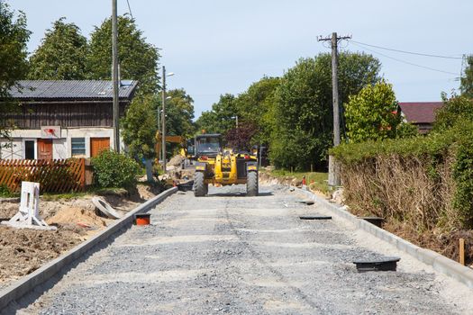 A road construction site with heavy equipment