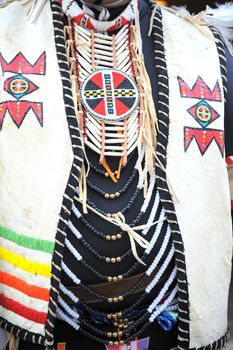 Native american indian in traditional clothing.