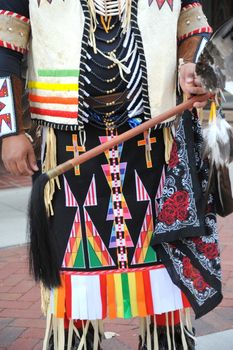 Native american indian in traditional clothing.