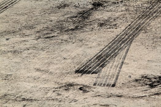 Background with tire marks on road track