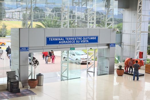 QUITO, ECUADOR  - AUGUST 8, 2014: The entrance/exit of the Terminal Terrestre Quitumbe bus terminal for long-distance buses on August 8, 2014 in Quito, Ecuador