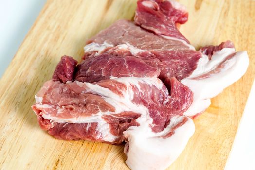 Fresh pork meat on a cutting board