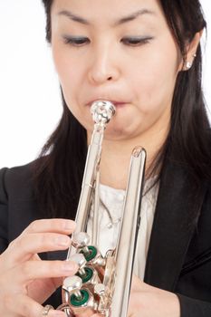 Portrait of a Female Trumpet Player - Isolated on White