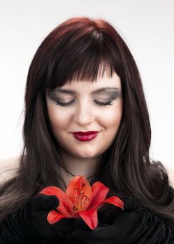 Portrait of a Beautiful Young Woman with Red Lily - Isolated on White