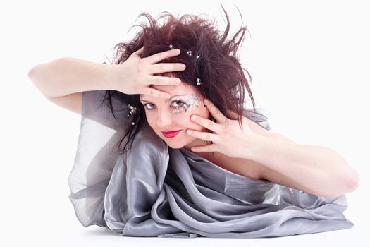 Portrait of Young Woman Lying on the Floor Looking - Isolated on White