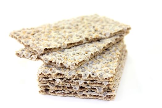 a stack of crispbread in front of white background