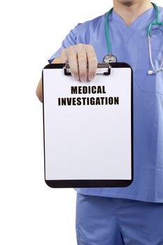 A doctor in blue uniform holding a clipboard with medical investigation.
