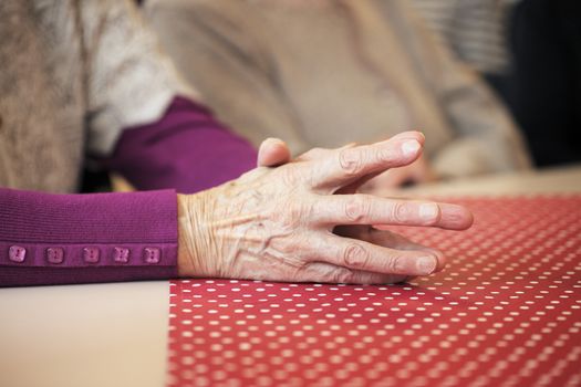 Hands of an old lady.