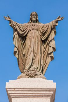 Outdoor Statue of Jesus with Open Arms