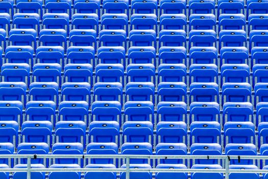 Empty Blue Bleachers Outdoors with Numbers - Nobody