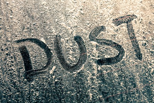 Dust Word on a Dusty Car Window