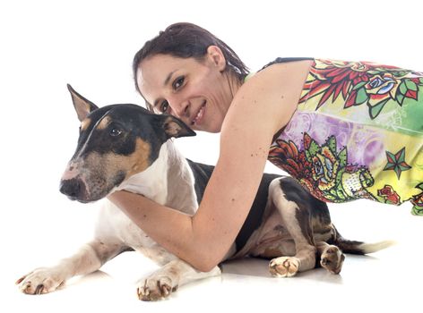 bull terrier and woman in front of white background