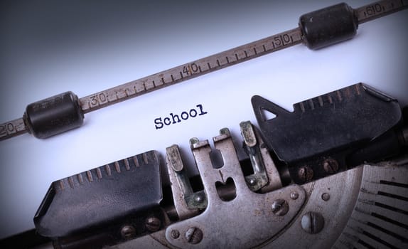 Vintage inscription made by old typewriter, School