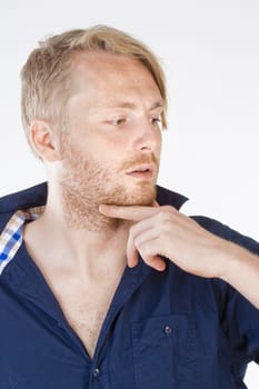 Young Man with Blond Hair Thinking