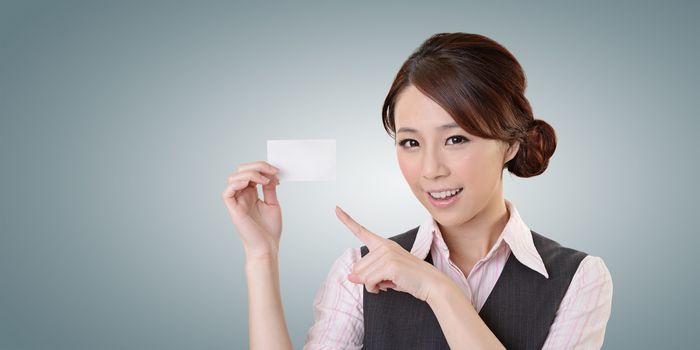 Cheerful business woman holding blank business card, closeup portrait with clipping path.