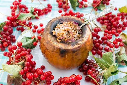 Pumpkin stuffed with buckwheat and  a onions