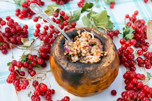 Pumpkin stuffed with buckwheat and  a onions