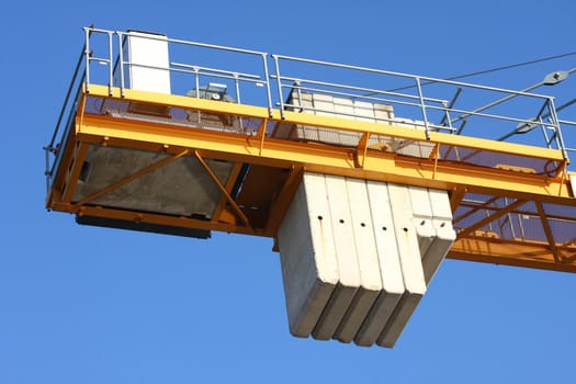 Huge crane platform on construction site of bridge