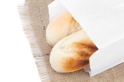 Bread packaged in a paper bag isolated on the white