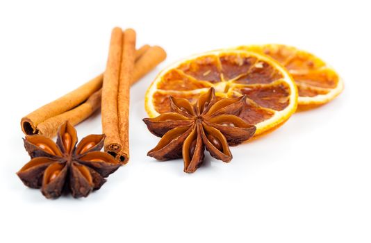 dry orange, cinnamon and Star Anise with copy space, on white background